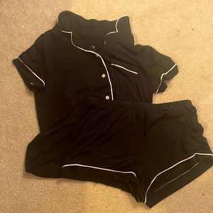 Small pink and black never used pajama set